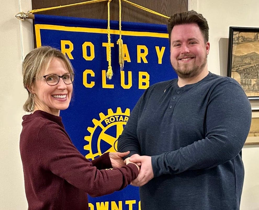 Thomas Darby receiving his Rotary pin when he joined the Rotary Club of Downtown Lock Haven