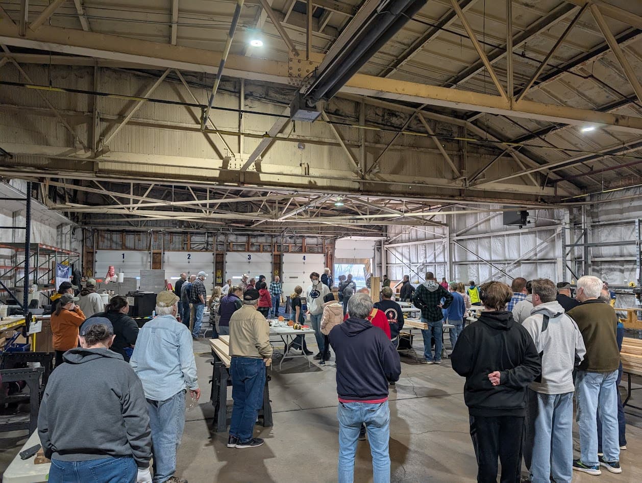 Community volunteers gathered for a build orientation